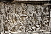 Prambanan - Ramayana reliefs of Shiva Temple. Detail of scene in which Rama, followed by Laksmana has shot the giant Kabandha.  